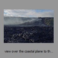 view over the coastal plane to the steaming tube system carrying lava from PuuOo area